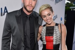 Actor Liam Hemsworth and singer Miley Cyrus attend the premiere of Relativity Media's 'Paranoia' at DGA Theater on August 8, 2013 in Los Angeles, California.