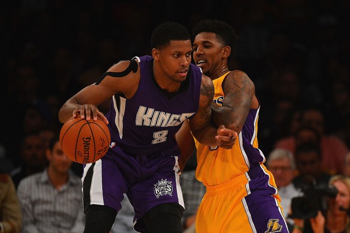 Sacramento Kings small forward Rudy Gay posts up against Los Angeles Lakers' Nick Young.