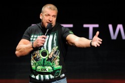 Triple H speaks at a news conference announcing the WWE Network at the 2014 International CES at the Encore Theater in Las Vegas.