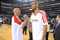 Jason Kidd and Tim Duncan shake hands before the 2010 NBA All-Star Game.