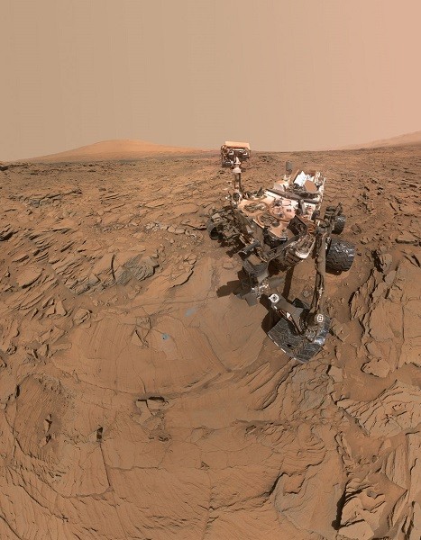 This self-portrait of NASA's Curiosity Mars rover shows the vehicle at a drilled sample site called "Okoruso," on the "Naukluft Plateau" of lower Mount Sharp.