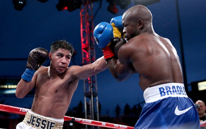 Jessie Vargas throws a punch at Timothy Bradley Jr. in their Interim WBO World Title welterweight fight at StubHub Center on June 27, 2015 in Los Angeles, California.