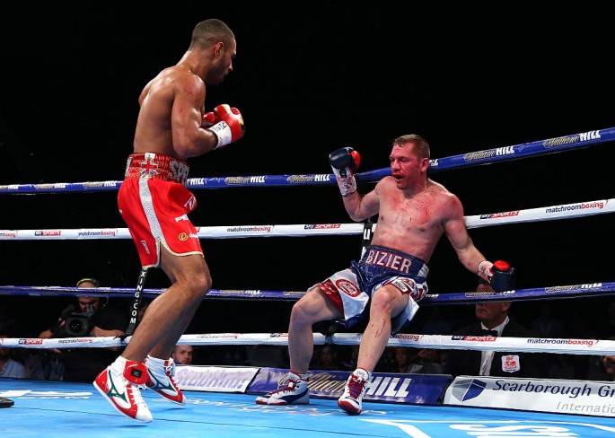Kell Brook knocks down and stops Kevin Bizier in the second round during his victory in the IBF World Welterweight Championship between Kell Brook and Kevin Bizier at Sheffield Arena on March 26, 2016 in Sheffield, England.