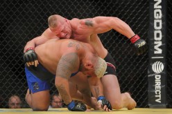 Brock Lesnar punches Mark Hunt (R) during the UFC 200 event at T-Mobile Arena on July 9, 2016 in Las Vegas, Nevada.