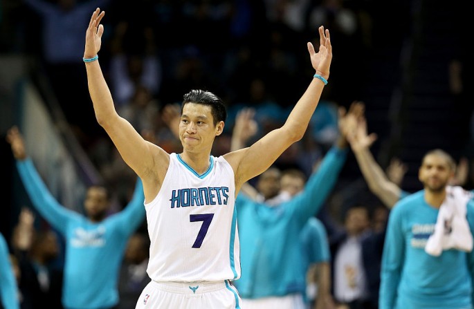  Jeremy Lin #7 of the Charlotte Hornets reacts after making a basket against the San Antonio Spurs during their game at Time Warner Cable Arena on March 21, 2016 in Charlotte, North Carolina.