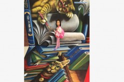 A girl poses for photo with a 3D painting in a shopping mall in Taipei, Taiwan, July 17, 2016. Over ten pieces of 3D paintings were presented in the mall.