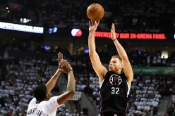 Los Angeles Clippers power forward Blake Griffin shoots over Portland Trail Blazers' Moe Harkless.