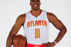 Dwight Howard poses in his new Atlanta Hawks number 8 jersey.
