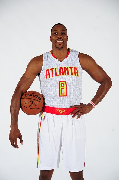 Dwight Howard poses in his new Atlanta Hawks number 8 jersey.