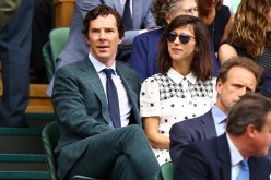 Benedict Cumberbatch and Sophie Hunter look on prior to the Men's Singles Final match between Andy Murray of Great Britain and Milos Raonic of Canada on day thirteen of the Wimbledon Lawn Tennis Championships at the All England Lawn Tennis and Croquet Clu