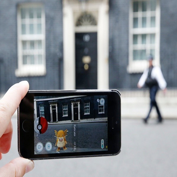 A Raticate, a character from Pokemon Go, a mobile game that has become a global phenomenon, on July 15, 2016, in Downing St , London, England. The app lets players roam using their phone's GPS location data and catch Pokemon to train and battle.The game h