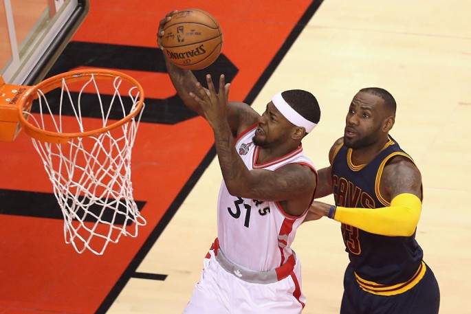 Terrence Ross #31 of the Toronto Raptors shoots the ball against LeBron James #23 of the Cleveland Cavaliers during the first half in game three of the Eastern Conference Finals during the 2016 NBA Playoffs at Air Canada Centre on May 21, 2016 in Toronto,