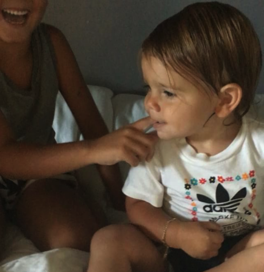 Mason and Reign Disick recreating the "Charlie bit me" viral video in a video posted by aunt Khloe Kardashian.