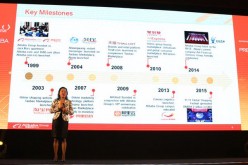 Alibaba Australia head Maggie Zhou presenting the range of Australian consumer products that are to be made available to the company's costumers.