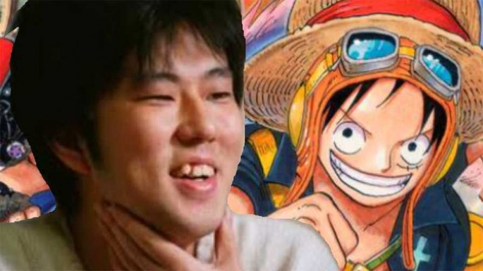 'One Piece' author Eiichiro Oda is seen in front of his own character, Luffy.