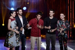 The Cast of Teen Wolf, Crystal Reed, Tyler Hoechlin, Tyler Posey, Dylan O'Brien, and Holland Roden receive the Best Ensemble Award on stage at the CW Network's 2013 Young Hollywood Awards  held at The Broad Stage on August 1, 2013 in Santa Monica, Califor