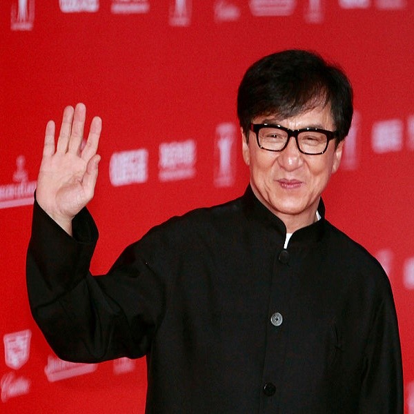 Jackie Chan poses for a picture on the red carpet at The 18th Shanghai International Film Festival on June 13, 2015 in Shanghai, China. 