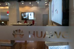 Employees man a Huawei Experience Store in Jiangsu Province.