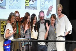 (L-R) Actors Natalie Dormer, Sophie Turner, Hannah Murray, Carice van Houten, Liam Cunningham, Alfie Allen, and Gwendoline Christie speak onstage at the 'Game of Thrones' panel during Comic-Con International 2015 at the San Diego Convention Center on July