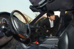 Smuggling suspect's armored car auctioned in Beijing.