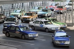 Taxi drivers wait for customers at the Hongqiao Airport in Shanghai.