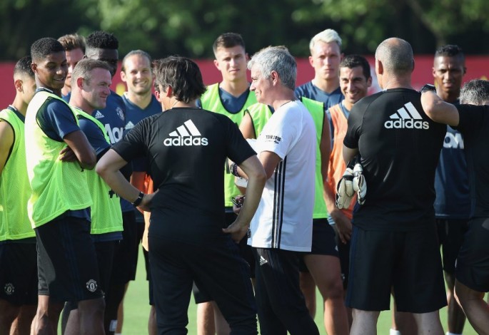 Manchester United players during practice for their pre-season game in China. The game was canceled due to bad weather.