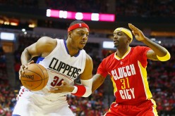 Los Angeles Clippers forward Paul Pierce goes against fellow veteran Jason Terry of the Houston Rockets.