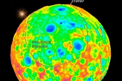 The top of this false-color image includes a grazing view of Kerwan, Ceres’ largest impact crater. This well-preserved crater is 280 km (175 miles) wide and is well defined with red-yellow high-elevation rims and a deep central depression shown in blue. K