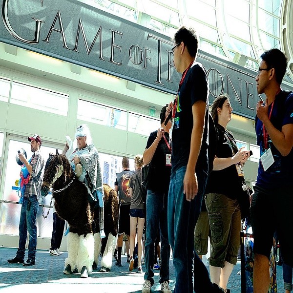 Karl Zingheim (L) of San Diego prepares to showcase his 'White Walker' costume, complete with undead horse, from the show 'Game of Thrones' as he enters the San Diego Convention Center for the 45th annual San Diego Comic-Con on July 24, 2014 in San Diego,