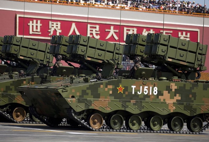 Military vehicles with anti-tank missiles, drive past the Tiananmen Gate during a military parade to mark the 70th anniversary of the end of World War Two on Sept. 3, 2015 in Beijing, China. 
