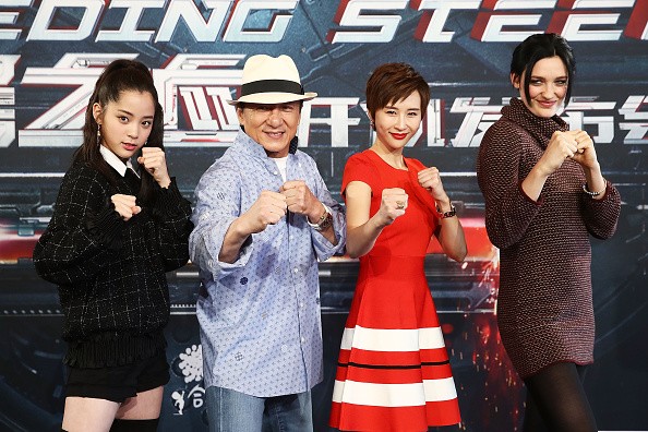 Nana Ouyang, Jackie Chan, Erica Xia-hou and Tess Haubrich pose during a press conference for "Bleeding Steel."