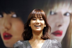 Actress Song Hye-Kyo poses during a photo session after the Press Conference: Gala Presentation 'Make Yourself at Home' during the 13th Pusan International Film Festival at Grand Hotel on October 5, 2008 in Busan, South Korea. The biggest film festival in