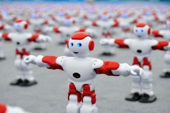 Intelligent robots dance at the main venue for 2016 Qingdao International Beer Festival in Huangdao District of Qingdao, east China's Shandong Province, July 30, 2016. 