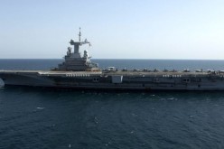 The French Navy aircraft carrier Charles de Gaulle on patrol.