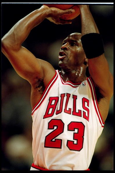 Michael Jordan attempts a free throw during a Chicago Bulls home game.