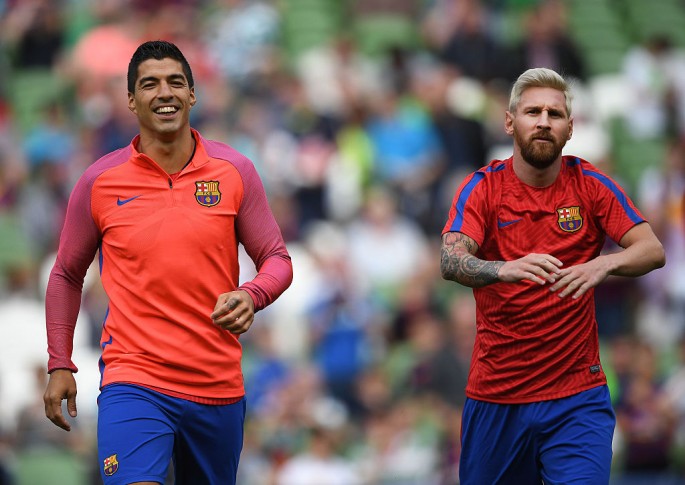FC Barcelona superstars Luis Suárez (L) and Lionel Messi.
