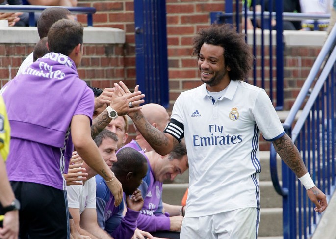 Real Madrid defender Marcelo (R) during the team's friendly against Chelsea.