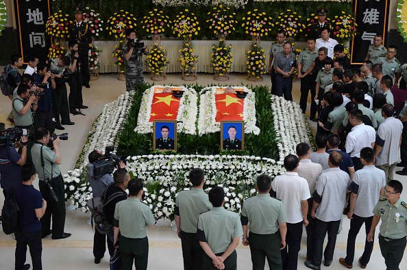 A memorial service was held for two Chinese peacekeepers who died in South Sudan last month.