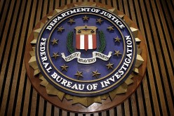 An ex-FBI employee pleads guilty to acting as an 