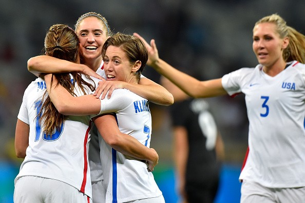 Players of the United States celebrate after Alex Morgan scores in the Women's Group G first round match between the United States and New Zealand during the Rio 2016 Olympic Games at Mineirao Stadium on August 3, 2016 in Belo Horizonte, Brazil. 