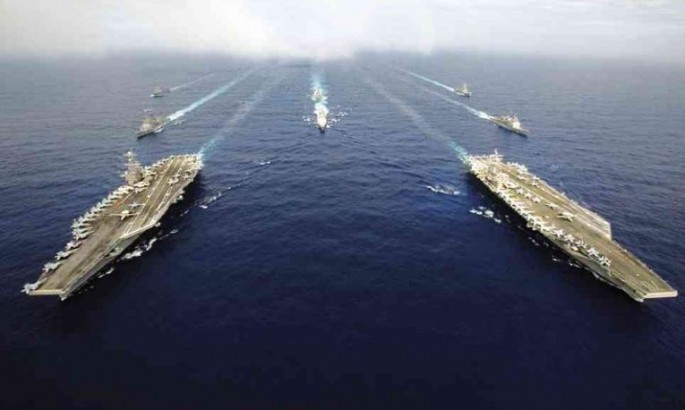 USS John C. Stennis and USS Ronald Reagan and their battle groups in the South China Sea.
