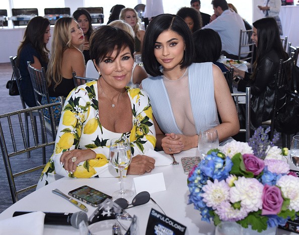 "Keeping Up With The Kardashians" star Kris Jenner (60) poses with daughter Kylie Jenner at a charity function. 
