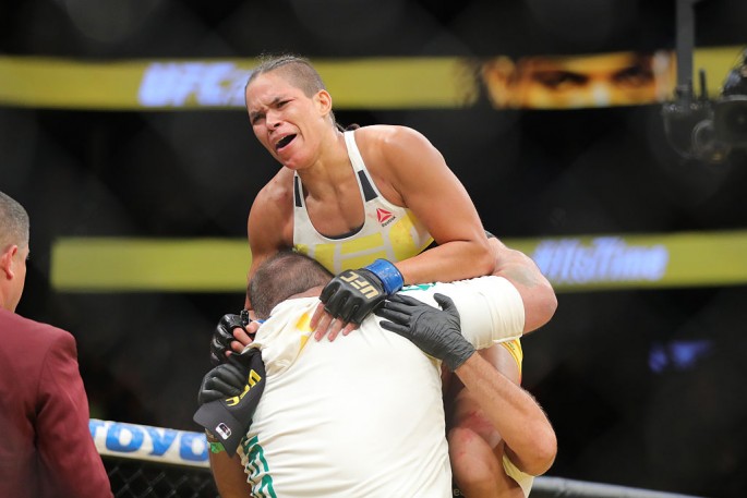 Amanda Nunes celebrates her victory over Miesha Tate during the UFC 200 event at T-Mobile Arena on July 9, 2016 in Las Vegas, Nevada.
