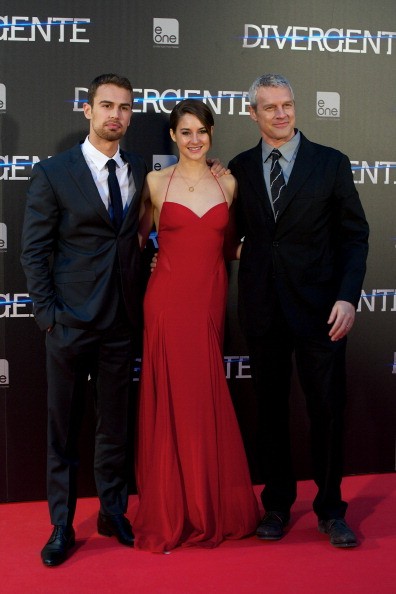 Actor Theo James, actress Shailene Woodley and director Neil Burger attend the 'Divergent' premiere at the Callao cinema on April 3, 2014 in Madrid, Spain. 