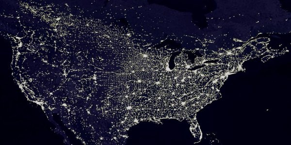 The U.S. power grid system is seen below an overview of a photo taken by satellites from space.