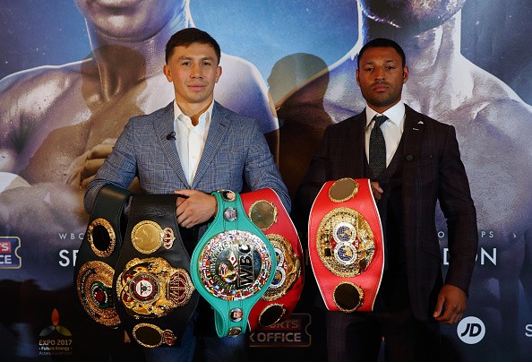 Gennady Golovkin (left) holds his four middleweight championship belts while Kell Brook (right) holds his welterweight title during the press conference for their fight on September