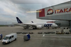 A LOT airliner waits for its flight at Warsaw Chopin Airport, Poland's international airport.