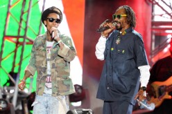 Rappers Wiz Khalifa (L) and Snoop Dogg perform onstage during day 3 of the 2012 Coachella Valley Music & Arts Festival at the Empire Polo Field on April 15, 2012 in California.  