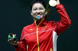 Mengxue Zhang of China wins gold medal in the Women's 10m Air Pistol event at the 2016 Rio Olympics.