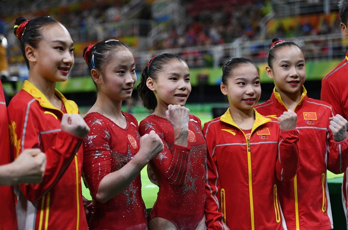 China's Artistic Gymnastics Women's team pose during the 2016 Rio Olympics.